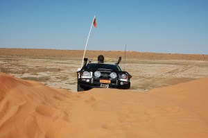 Shaun coming over the crest at Big Red