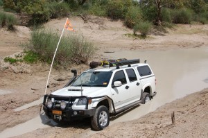 Shaun crossing Eyre Creek (he got stuck on exit - Dad had to winch him out after taking a 10 K detour)