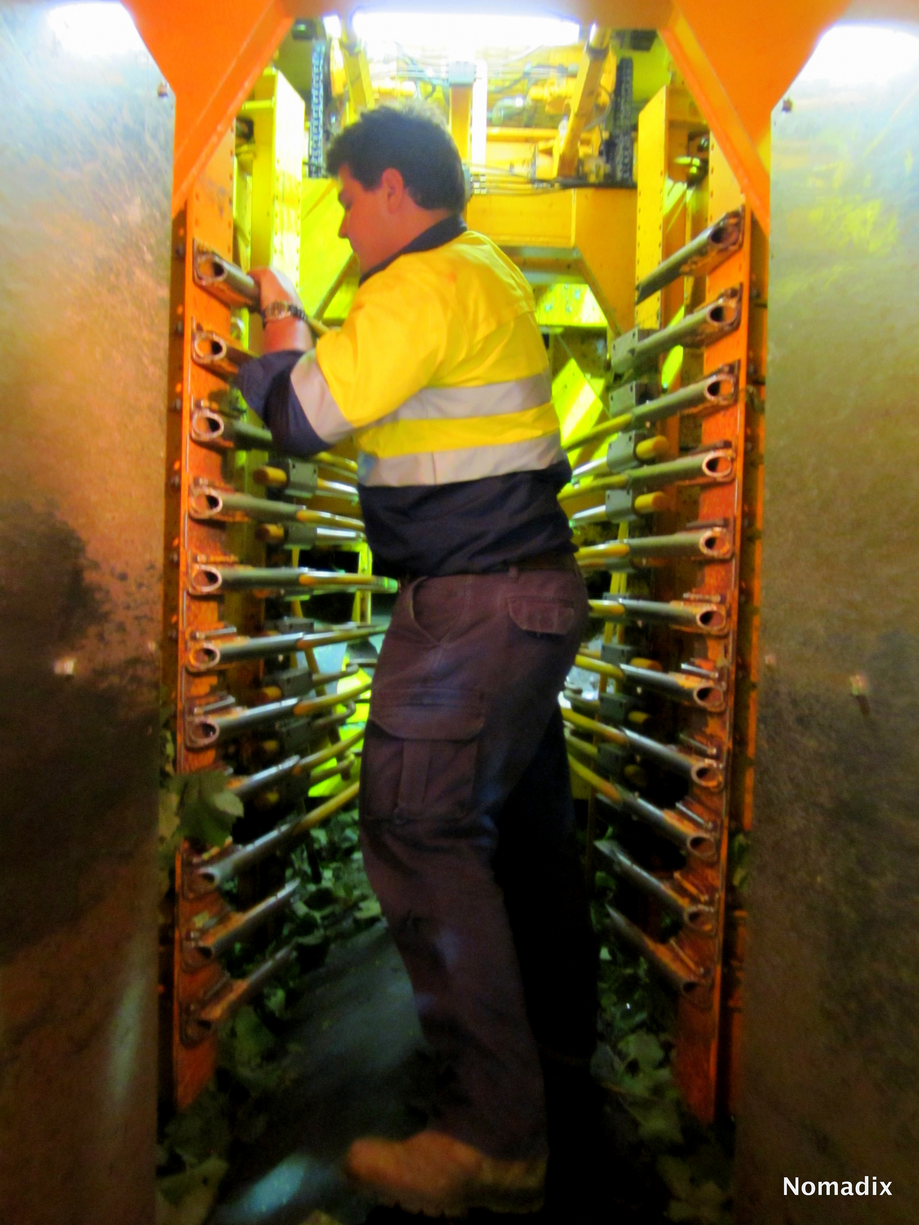 Shaun fitting the Rods to the Harvester for the Next Block
